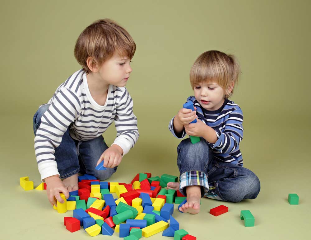 Young boys building blocks